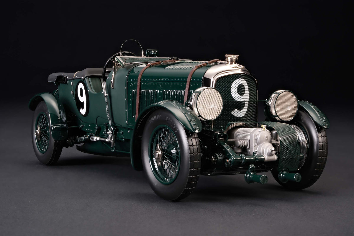 "1929 Bentley Blower" - 1930 Le Mans - Birkin & Chassagne - a dark green vintage 1:18 scale model positioned on a dark background.