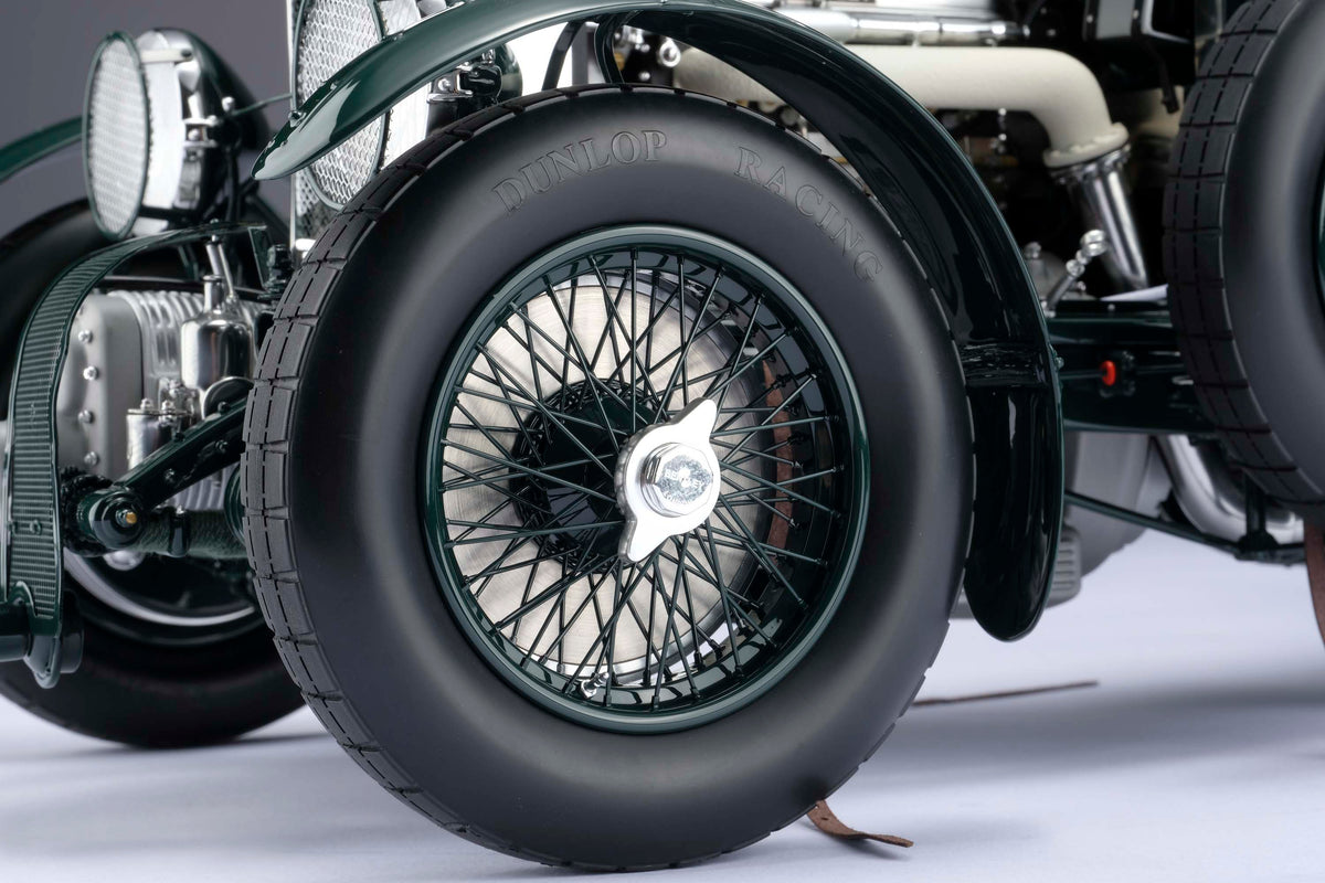 "1929 Bentley Blower" - 1930 Le Mans - Birkin & Chassagne detail shot of a 1:8 scale model's tire, positioned on a light background.
