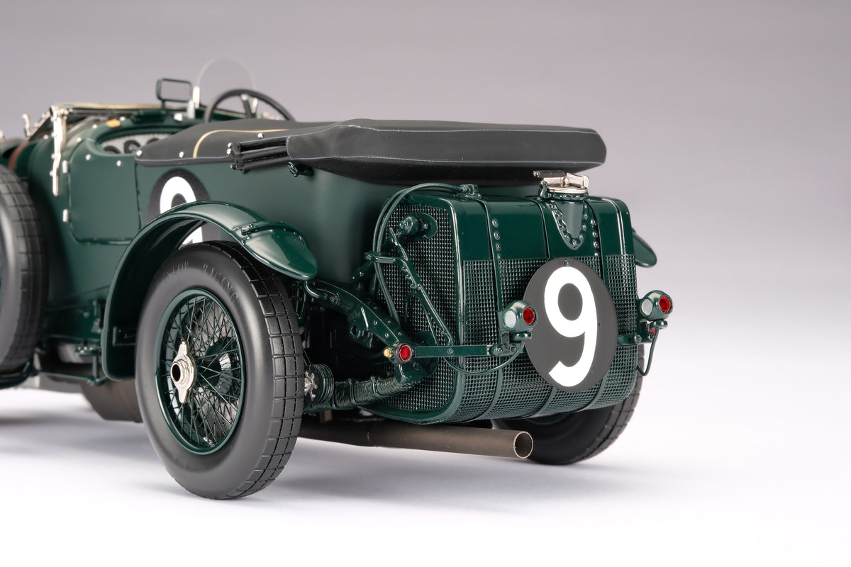 "1929 Bentley Blower" - 1930 Le Mans - Birkin & Chassagne - a dark green vintage 1:18 scale model positioned on a light background.