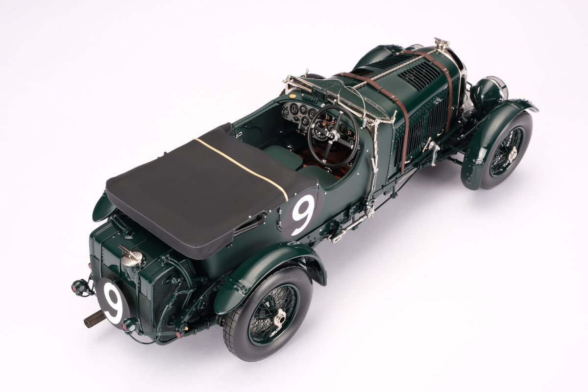 "1929 Bentley Blower" - 1930 Le Mans - Birkin & Chassagne - a dark green vintage 1:18 scale model positioned on a light background.