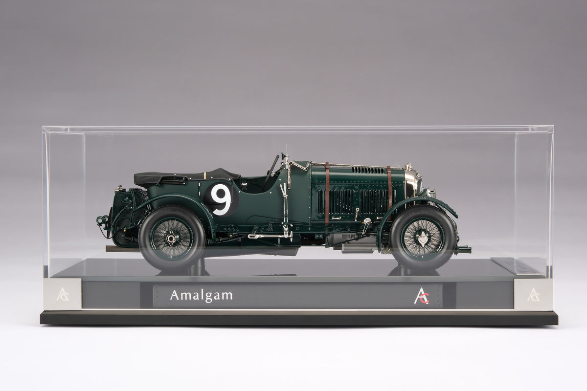 "1929 Bentley Blower" - 1930 Le Mans - Birkin & Chassagne - a dark green vintage 1:18 scale model in a display box that is positioned on a light background.