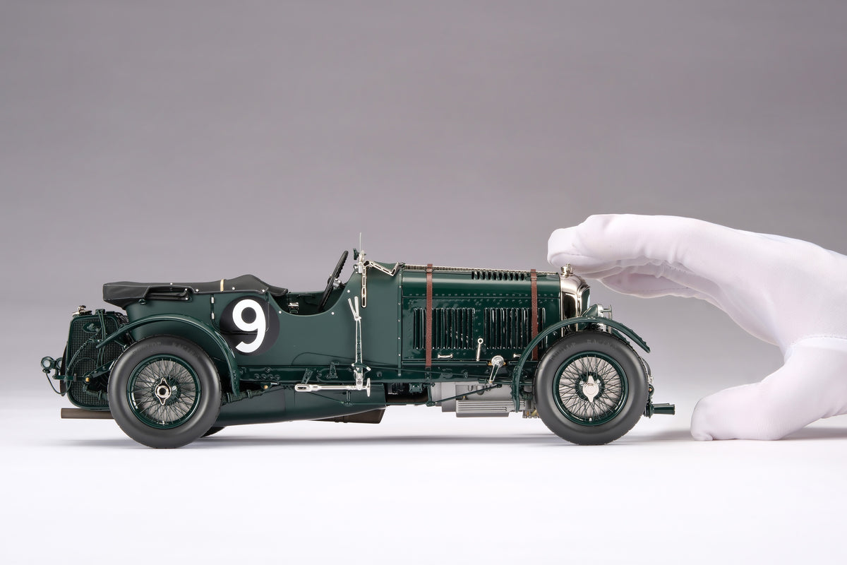"1929 Bentley Blower" - 1930 Le Mans - Birkin & Chassagne - a dark green vintage 1:18 scale model positioned on a light background.