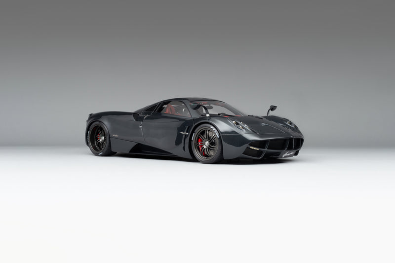https://www.amalgamcollection.com/cdn/shop/products/M5487-76-PaganiHuayra1.8ScaleCarbon-Front3.4WIDEEDIT_800x533_crop_center.jpg?v=1612377586